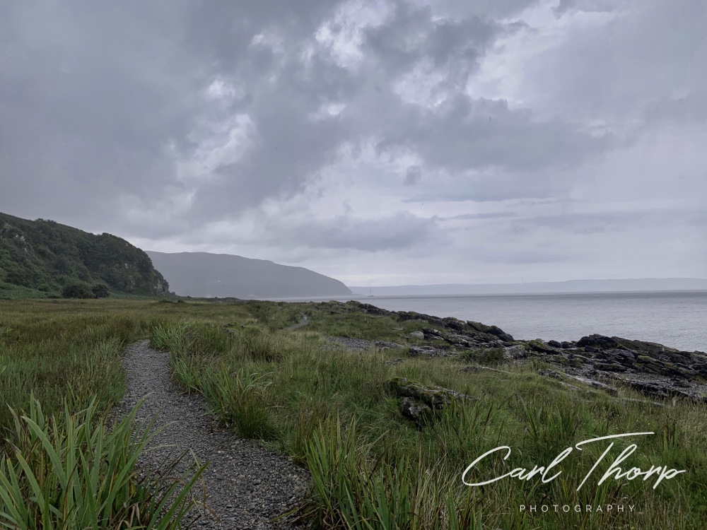 Waiting for the rain to stop on the coastal path north of Lochranza.