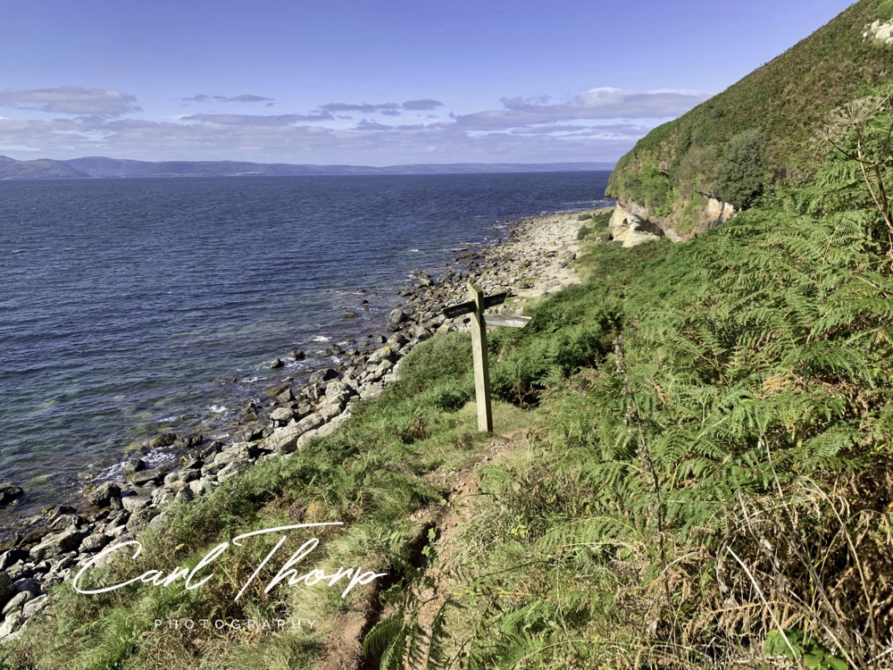 Sign post on the coastal path to Kings Caves Isle of Arran
