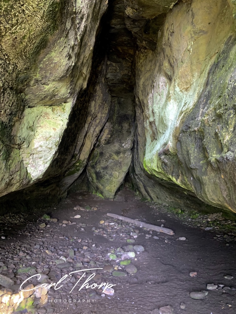 Inside the Kings Cave looking at the rock art